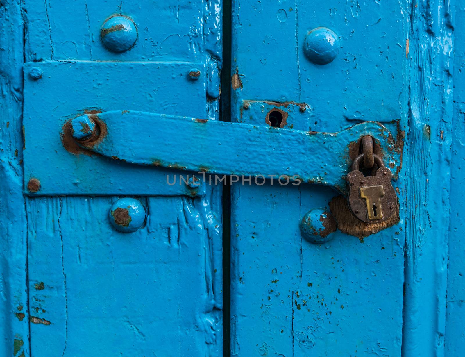 Vintage Sturdy Blue Wooden Door With Heavy Metal Lock