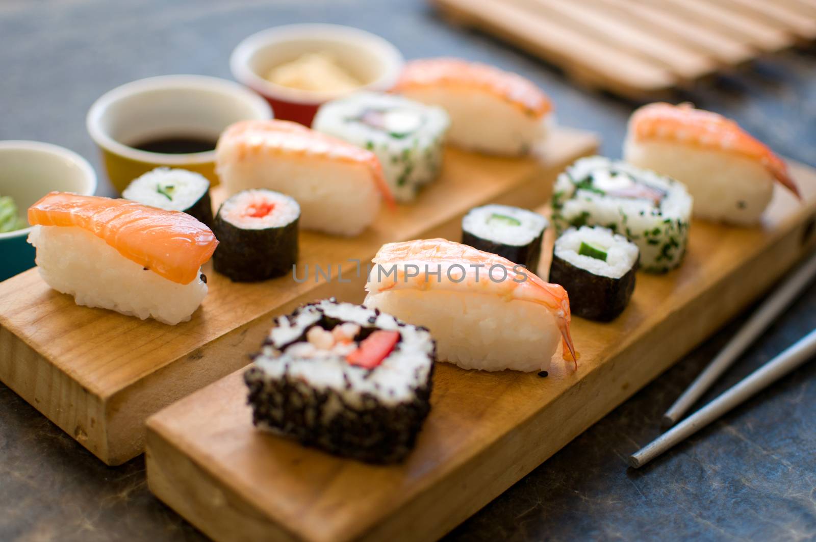 Assorted sushi selection includingi prawns, salmon and rice