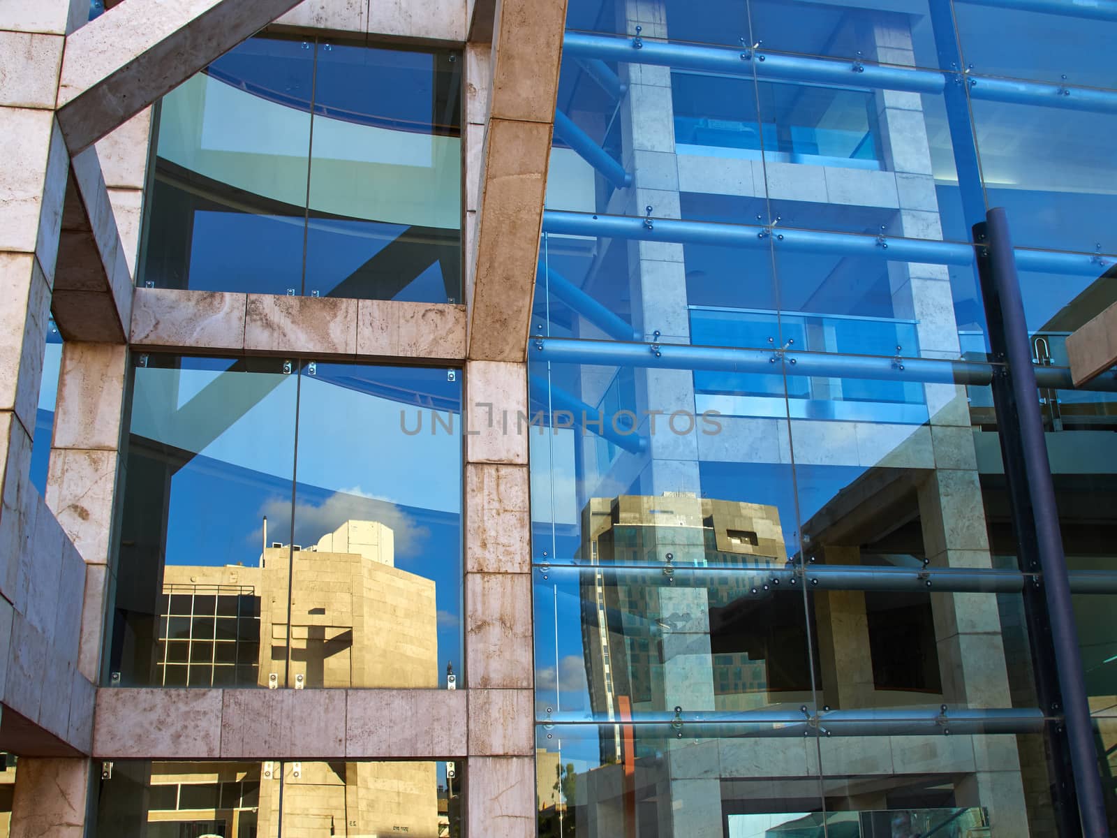 Details of abstract modern design building with glass clad facade