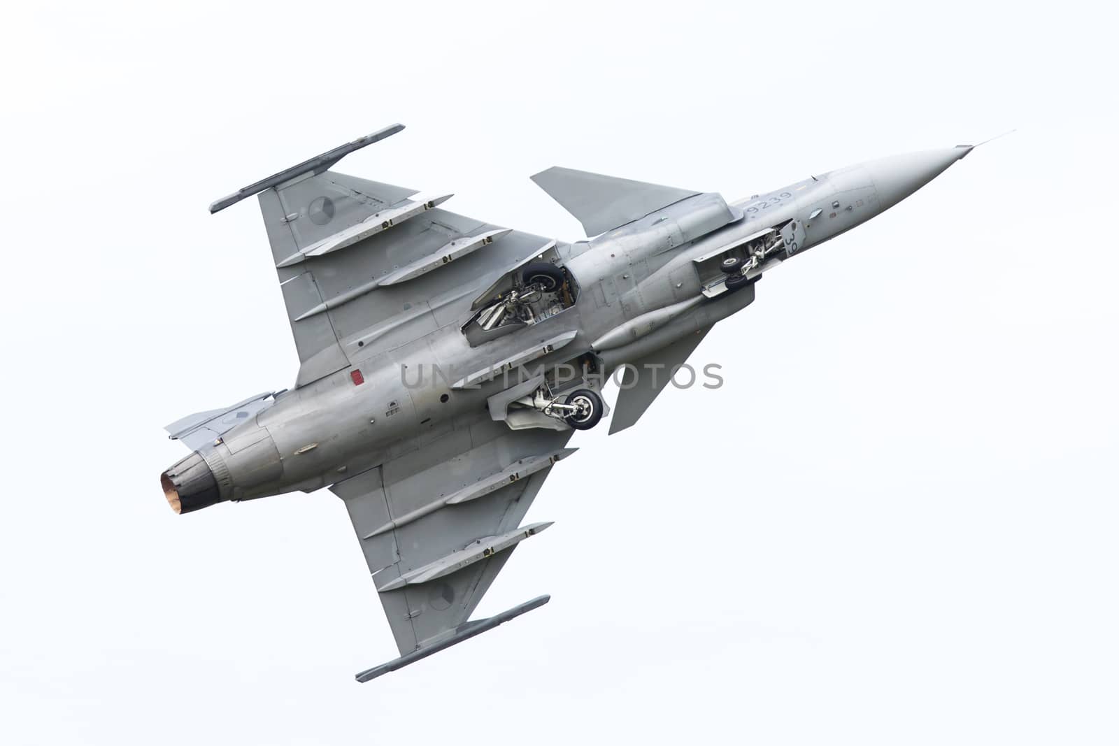 LEEUWARDEN, THE NETHERLANDS-JUNE 10: Modern tactical fighter jet JAS-39 Gripen performs at the Dutch Airshow on June 10, 2016 at Leeuwarden Airfield, The Netherlands.