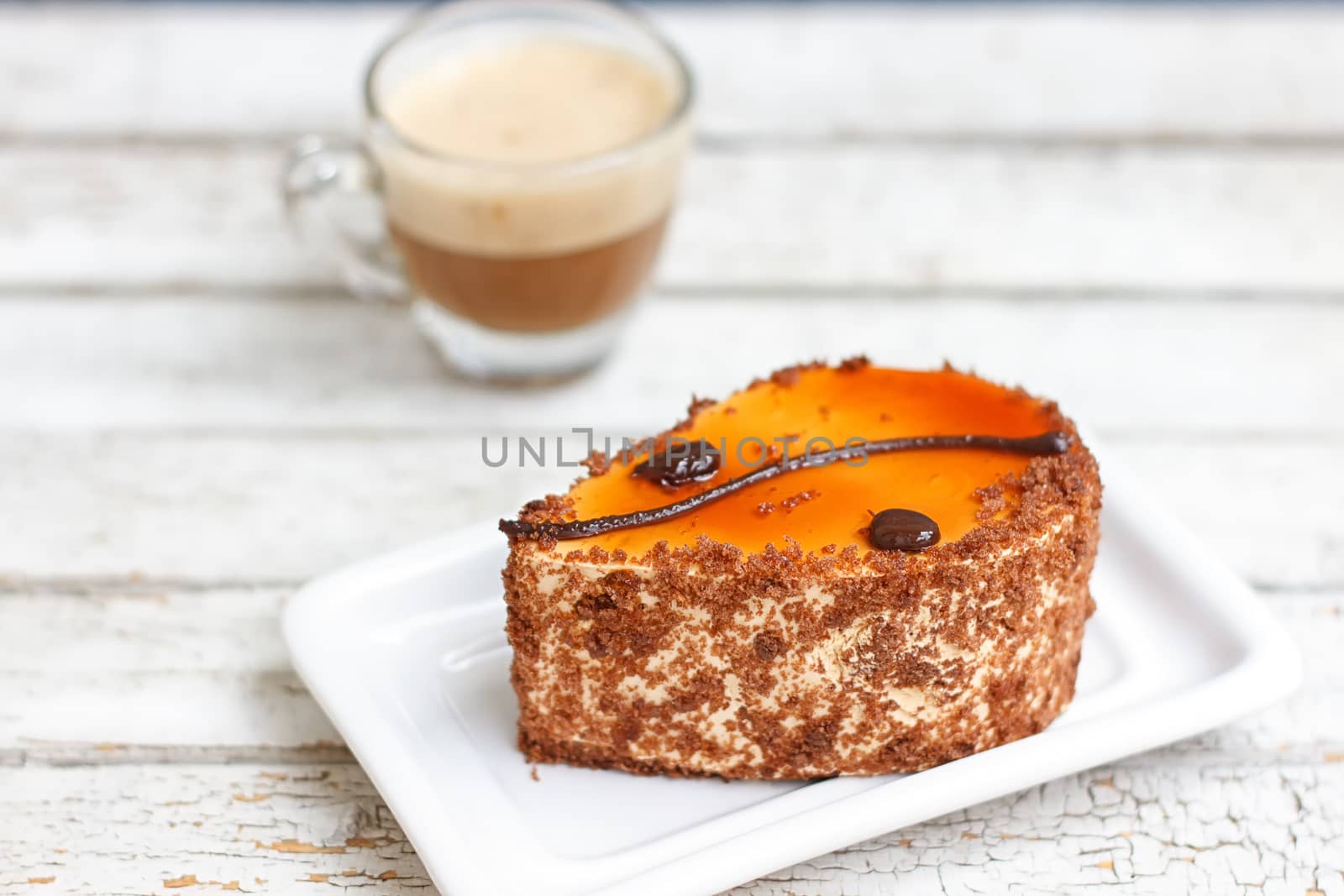 coffee cake and cup of coffee on old wooden table