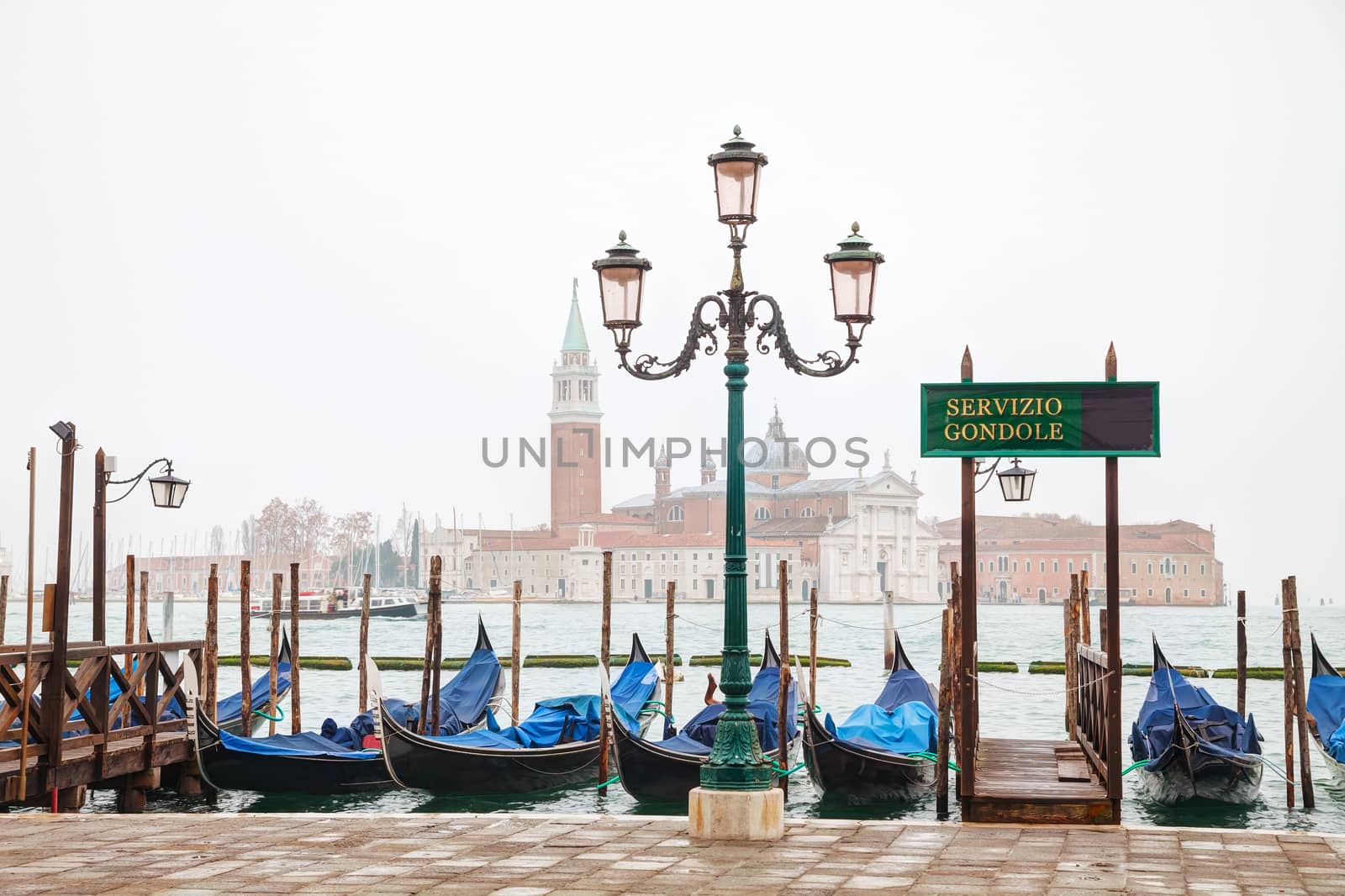 Gondolas floating in the Grand Canal on a cloudy day