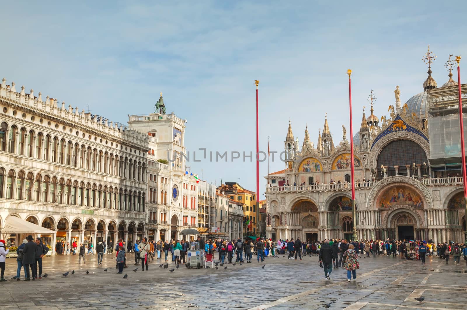 San Marco square with tourists in Venice by AndreyKr