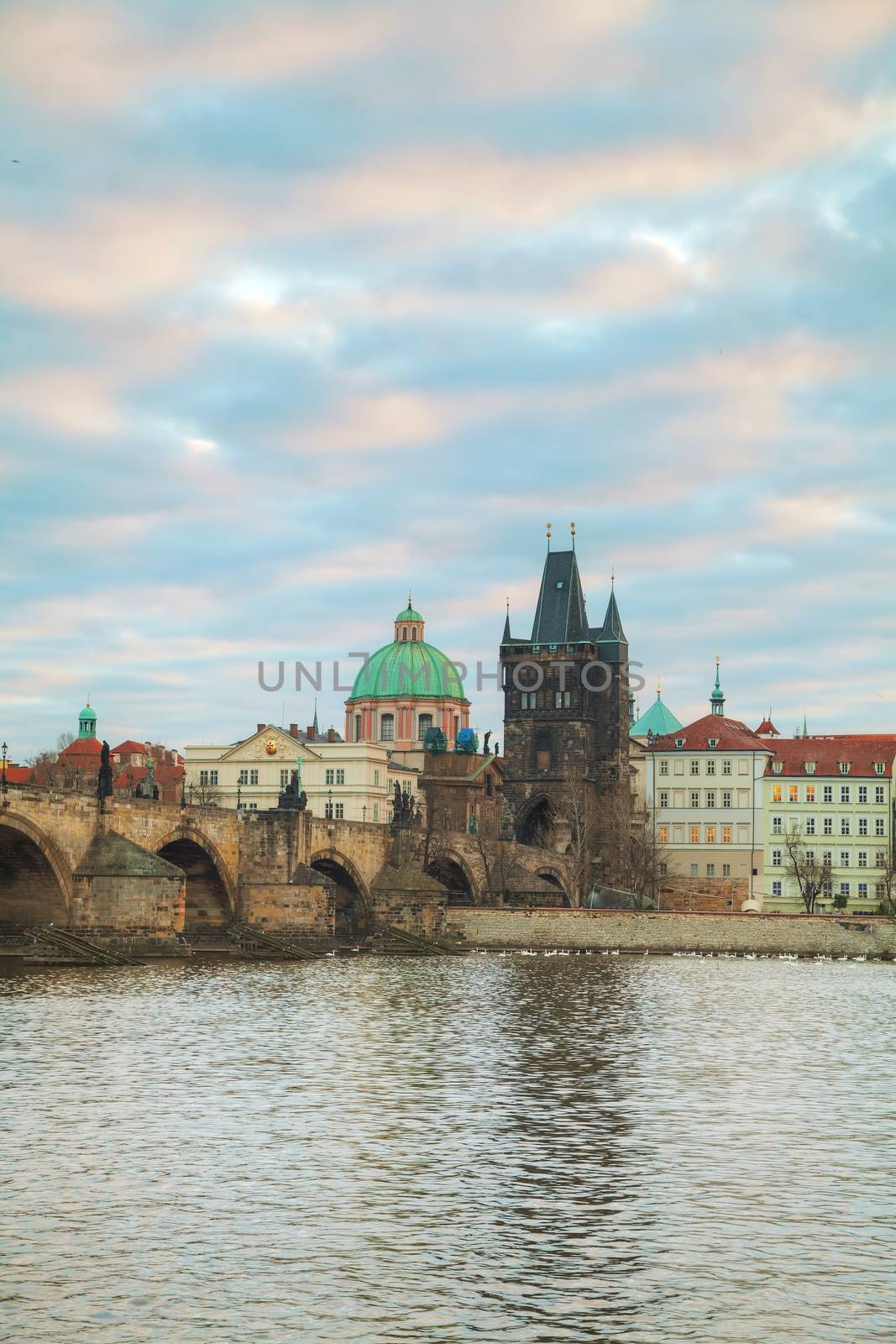 Charles bridge in Prague at sunrise by AndreyKr