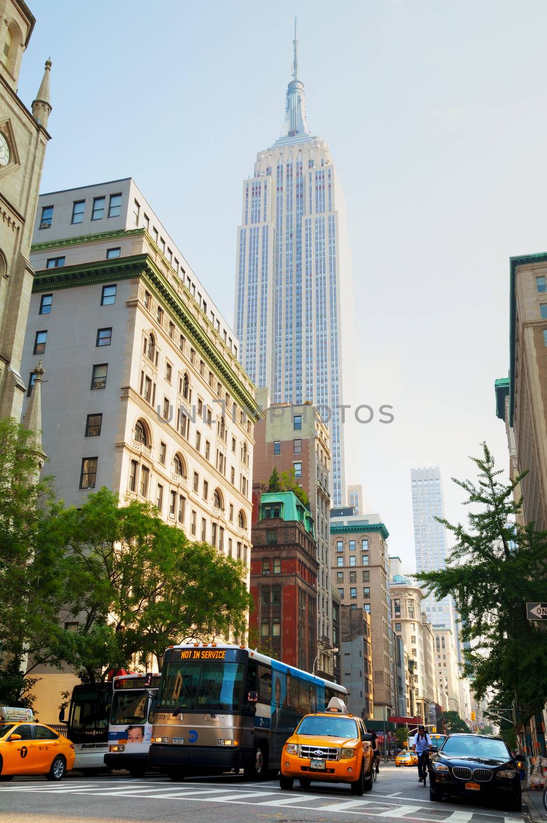 NEW YORK CITY - SEPTEMBER 04: Yellow cab at 5th Avenue in the morning on October 4, 2015 in New York City. It's the most populous city in the United States[1] and the center of the New York metropolitan area.