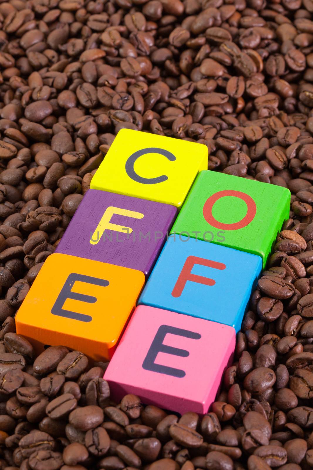 Colored children's cubes and coffee beans