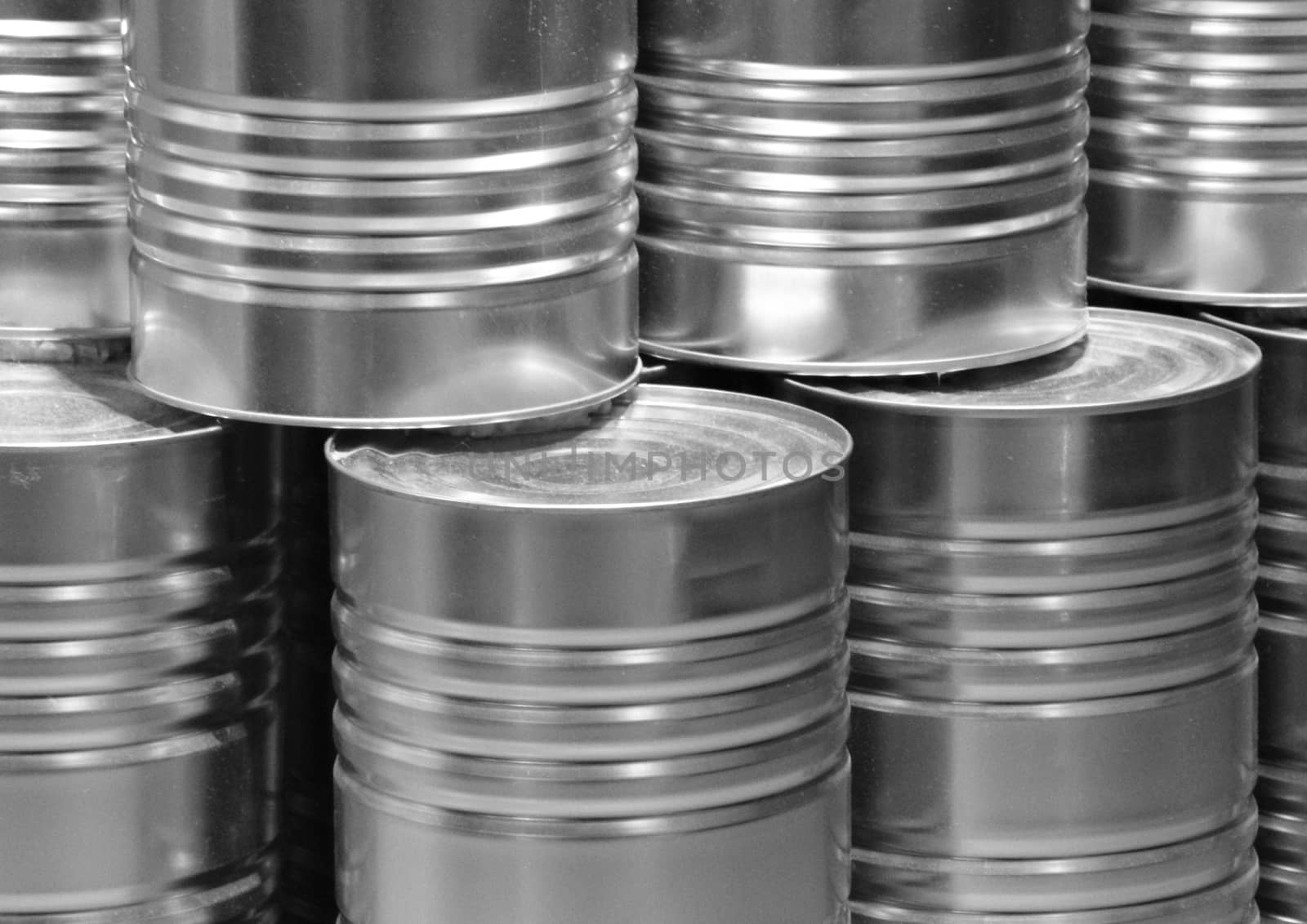 Silver metal food cans closeup on stack