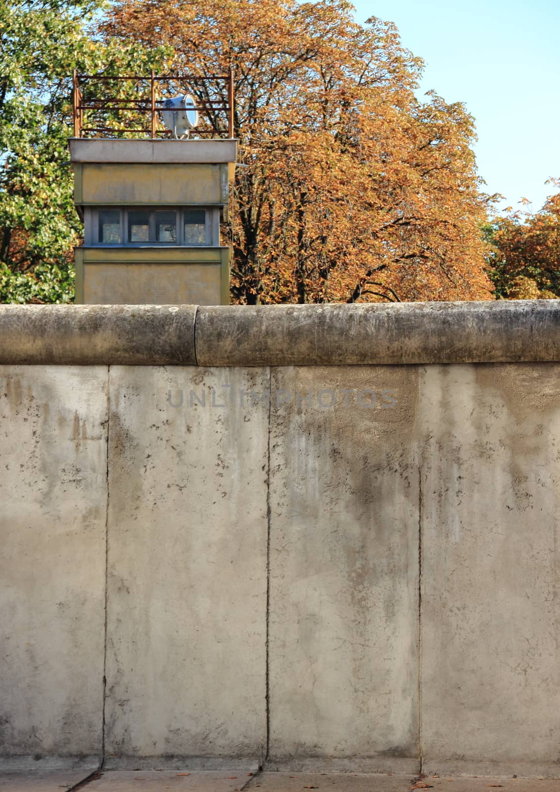 Berlin wall Germany with guard tower in autumn