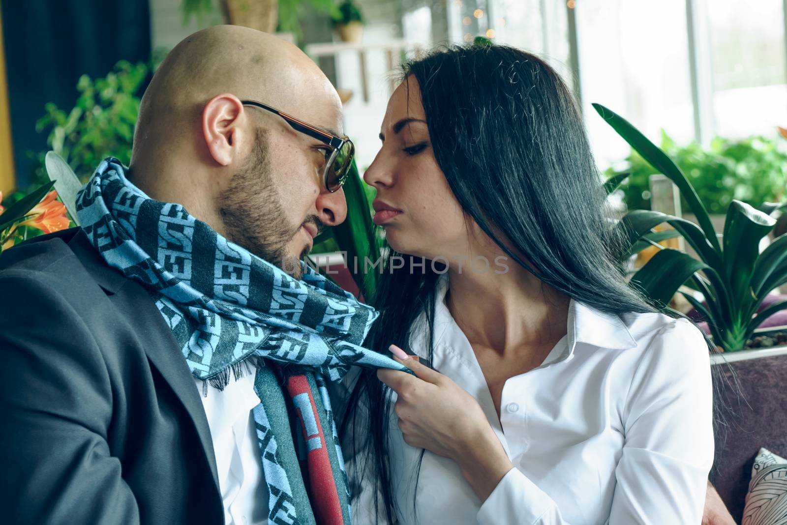 Arab man hugs and kisses a beautiful girl by vipvn