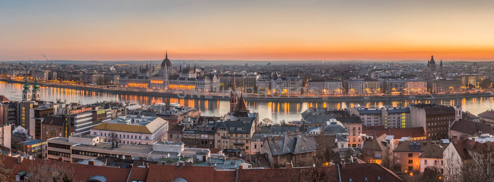 Wide Panorama of Budapest with Hungarian Parliament and Danube River at Dusk