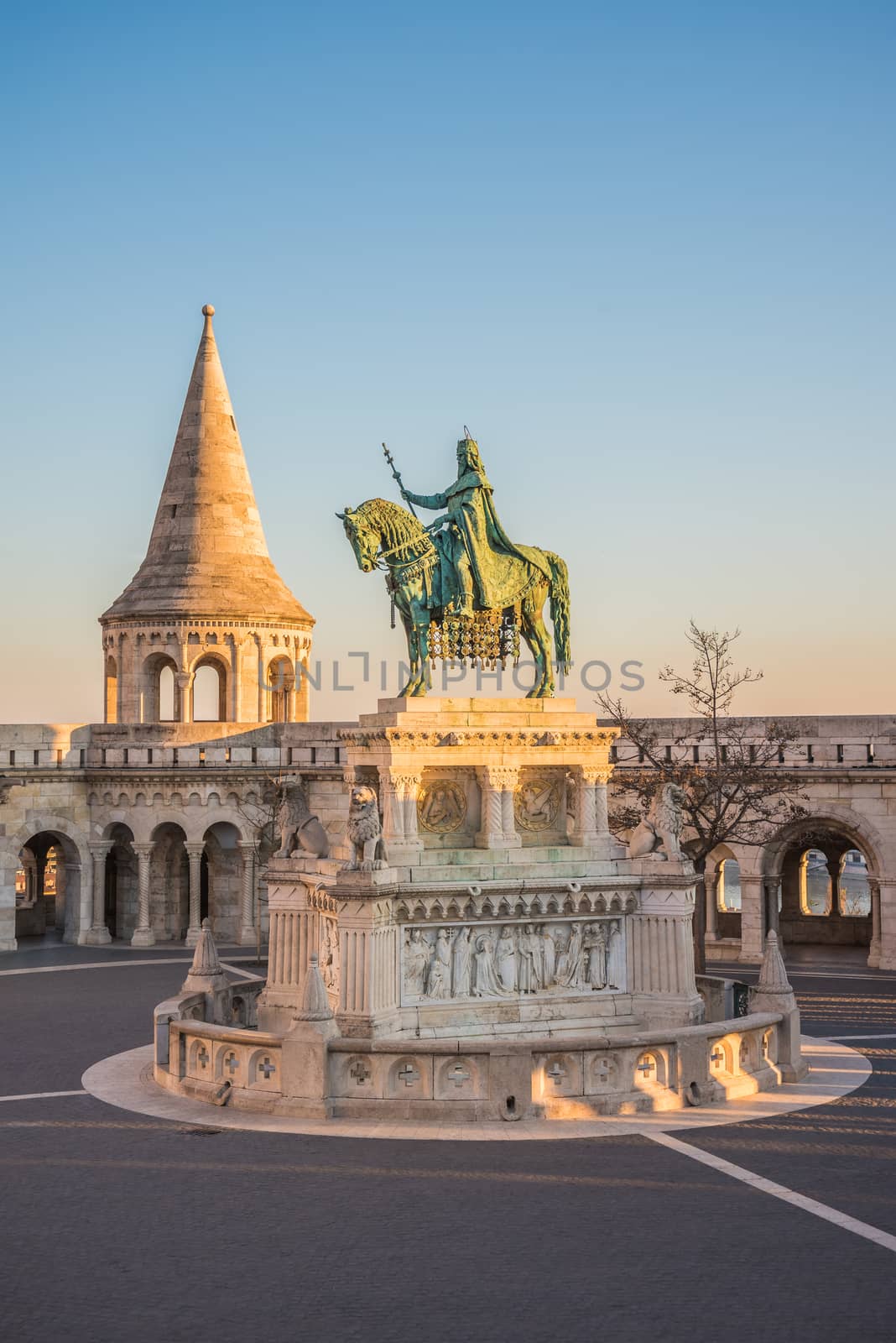 Saint Stefan Statue at Fisherman's Bastion, in Budapest, Hungary with Clear Blue Sky in Background at Sunrise