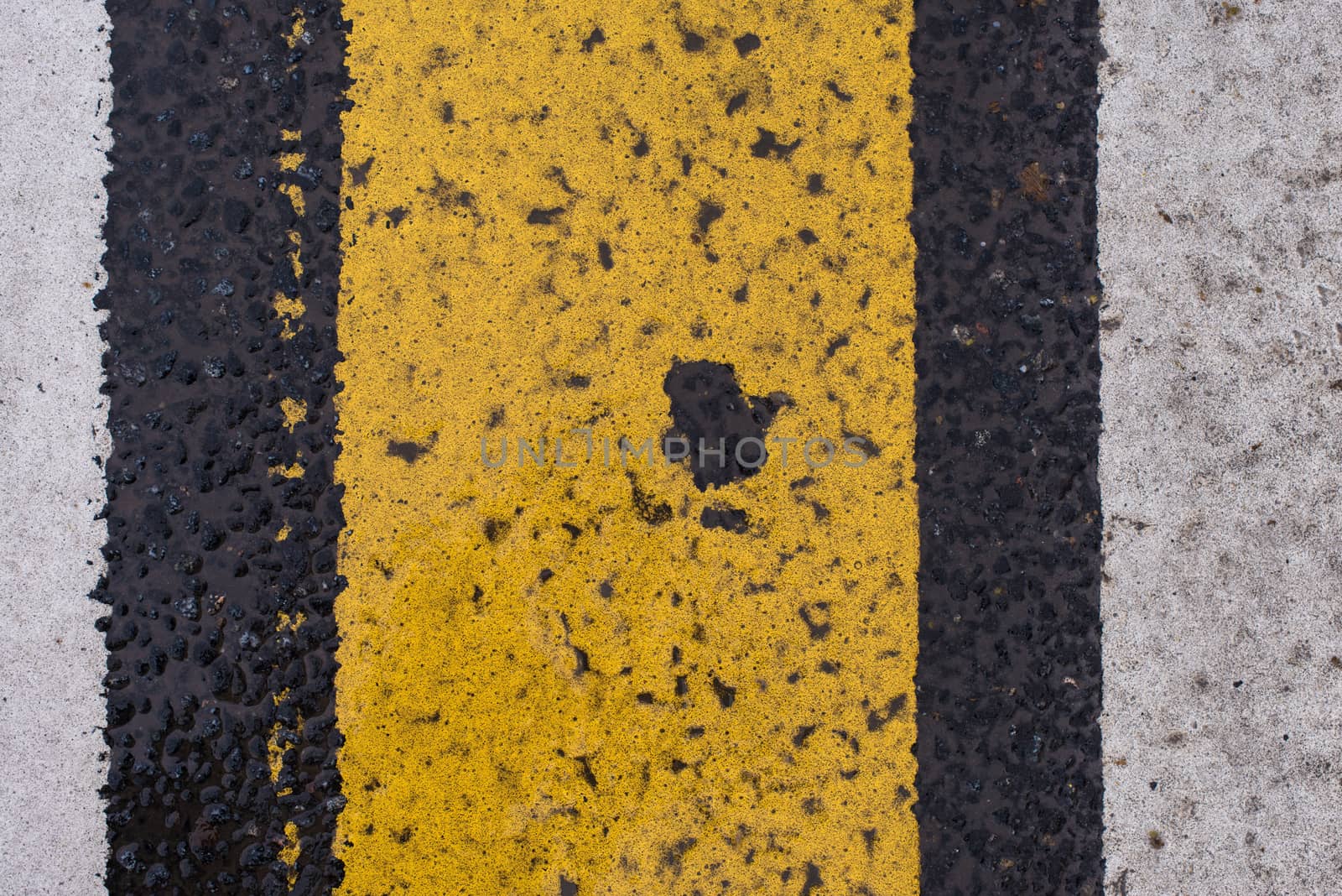 Asphalt highway texture with cracked white and yellow stripe by skrotov