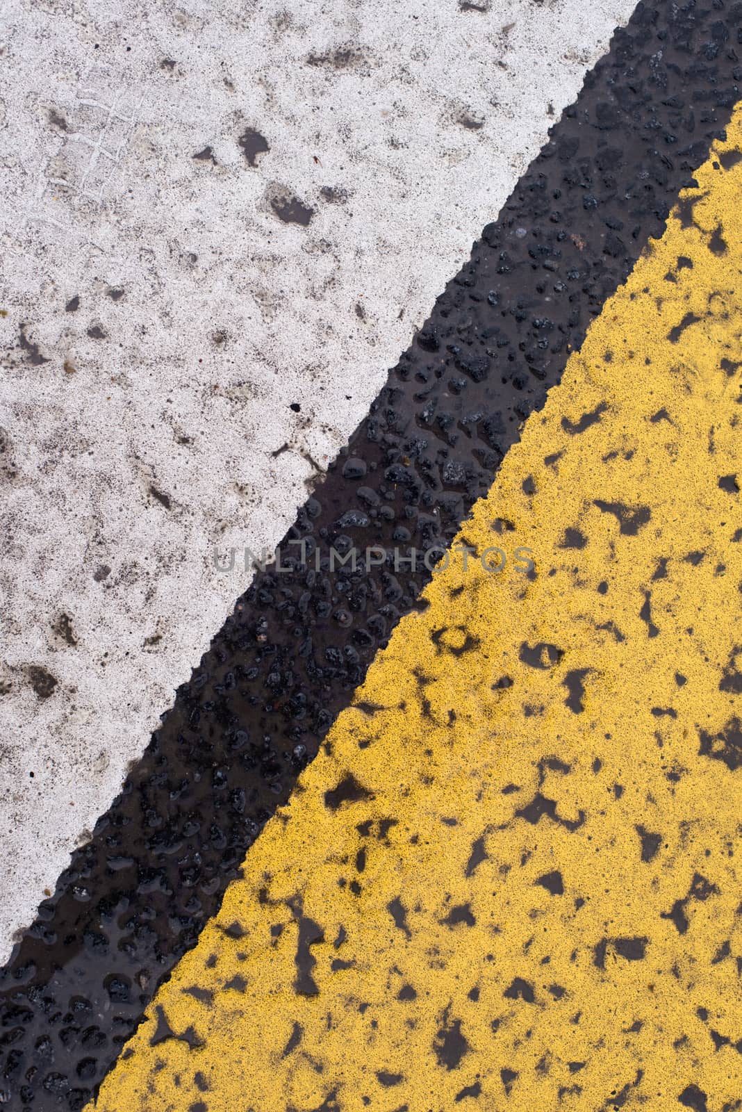 Asphalt highway texture with cracked white and yellow stripe by skrotov