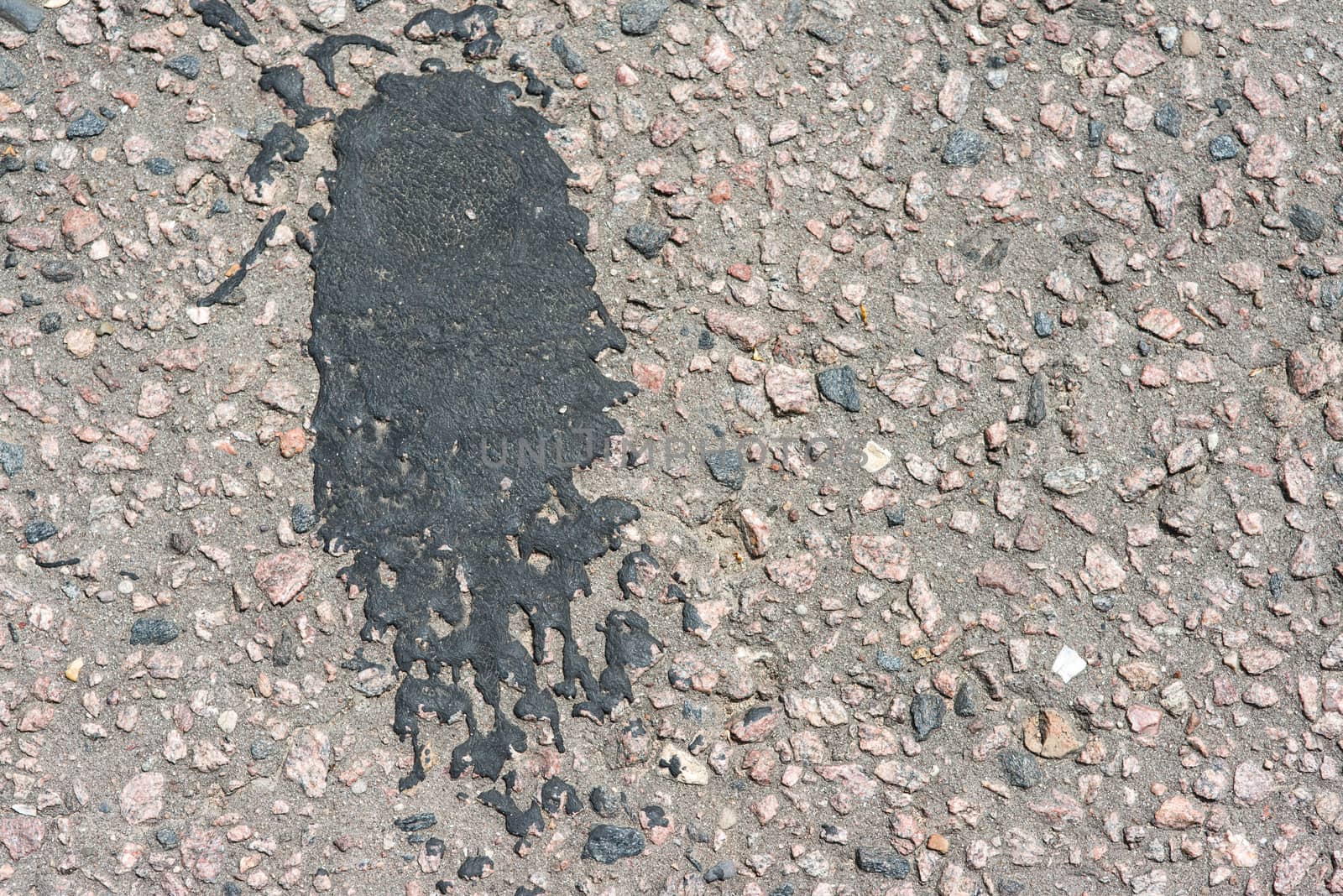 asphalt texture with big black spots.