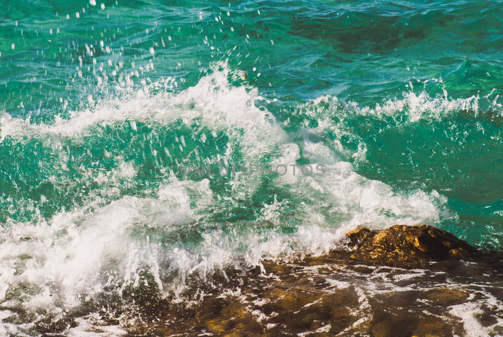 Photo of beautiful clear turquoise sea ocean water surface with ripples and bright splash on seascape background, horizontal picture by skrotov