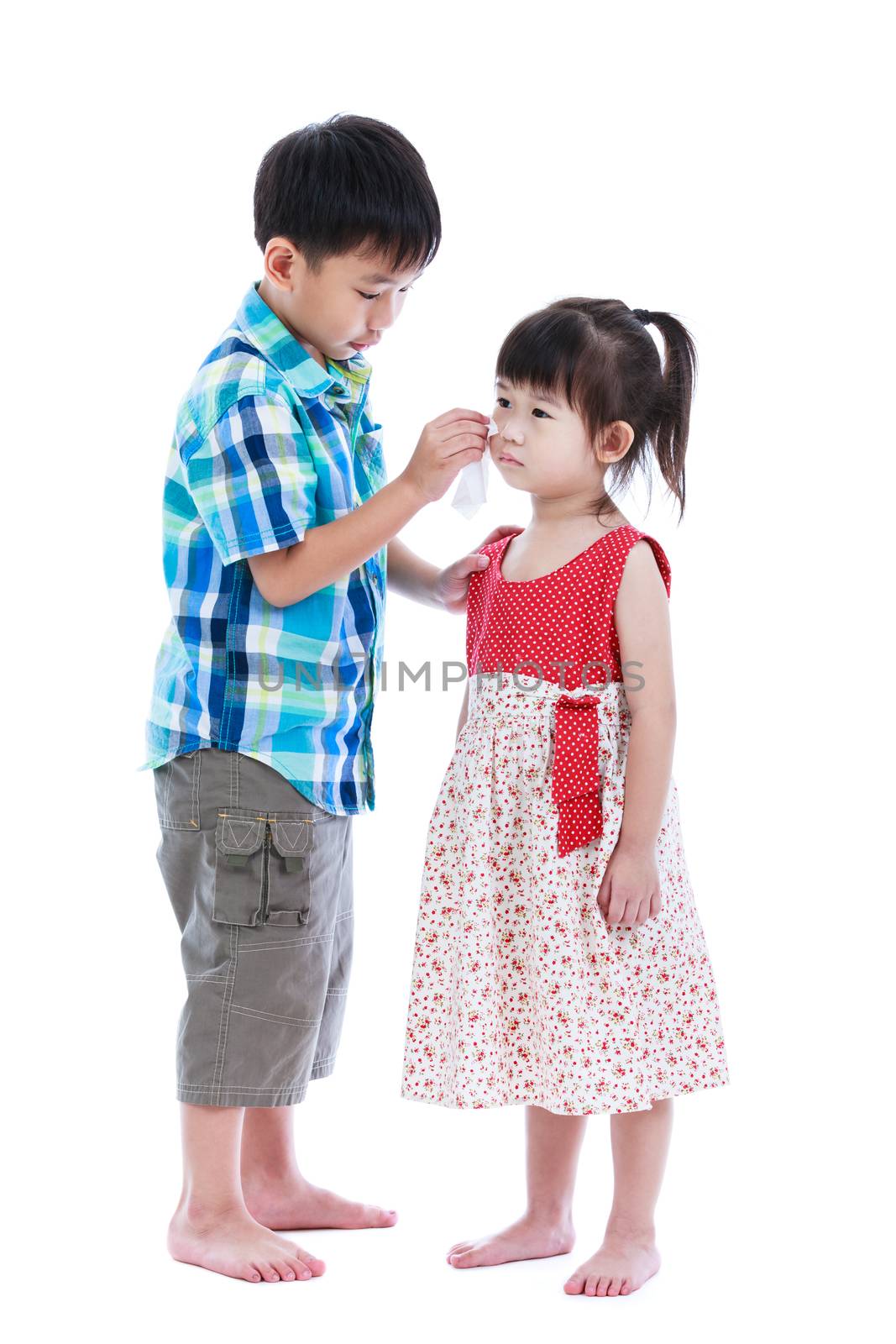 Full body. Elder brother is comforting his crying sister. Isolated on white. by kdshutterman