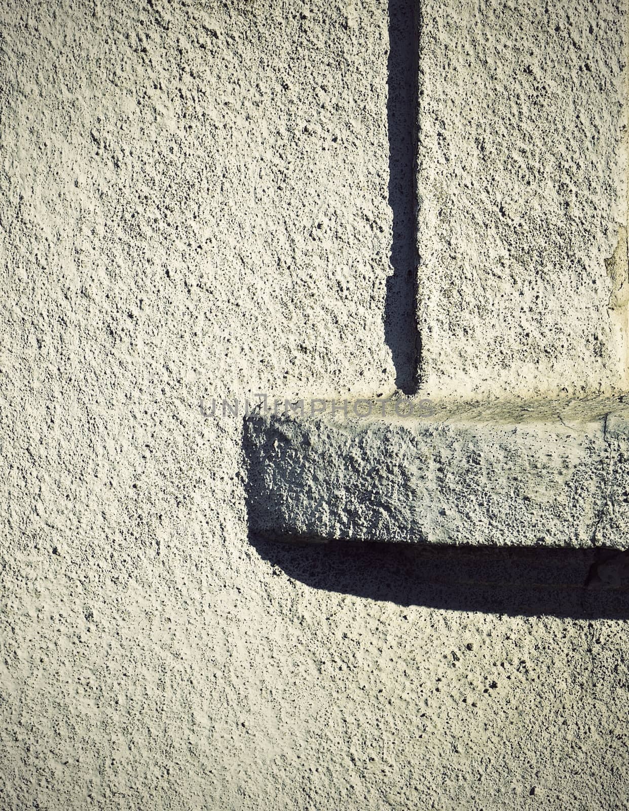 abstract background detail on the ledge on the wall plaster