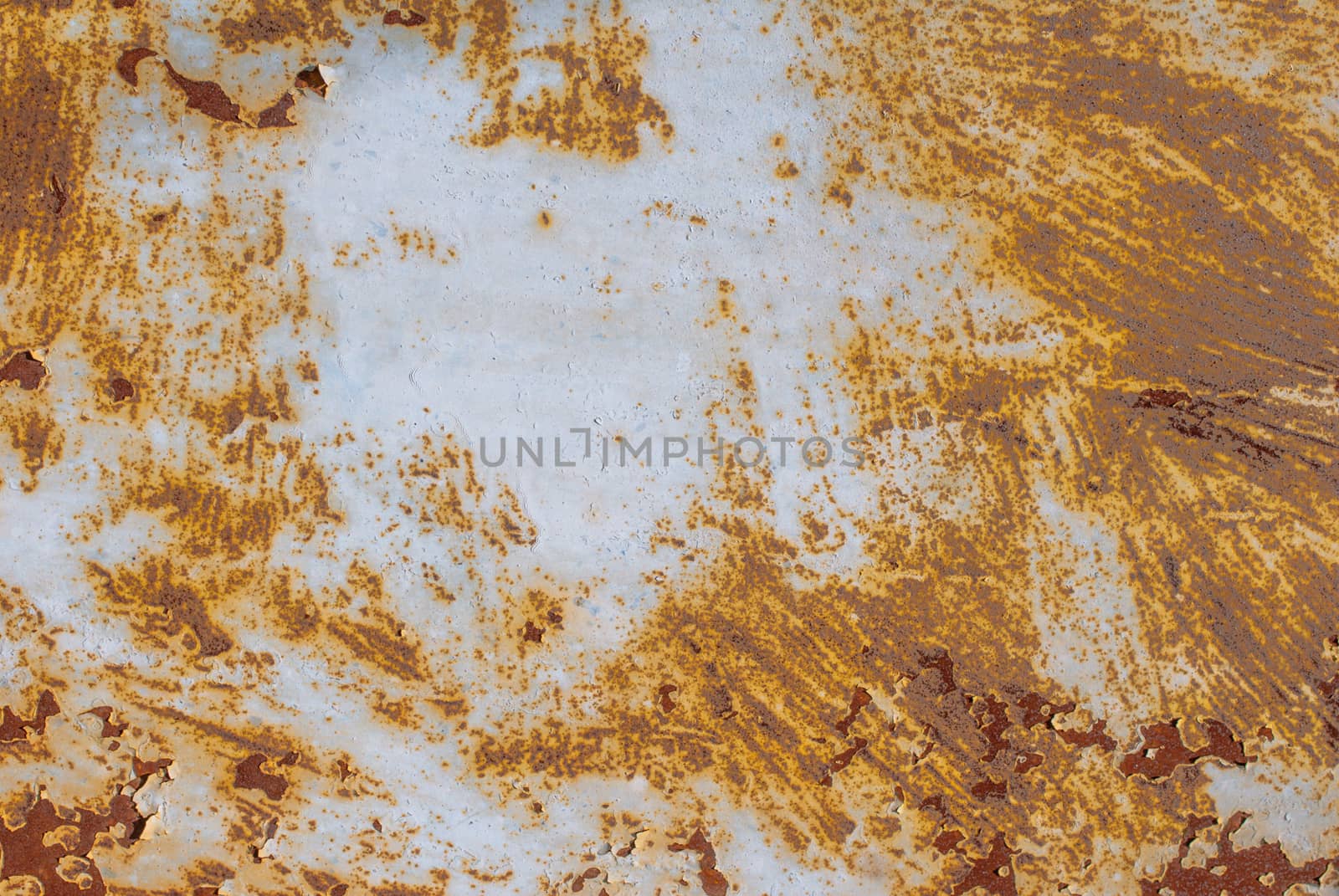 surface of rusty iron with remnants of old paint, grunge metal surface, great background or texture for your project by uvisni
