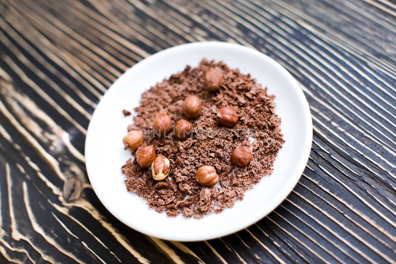 Grated chocolate with nuts by lanser314