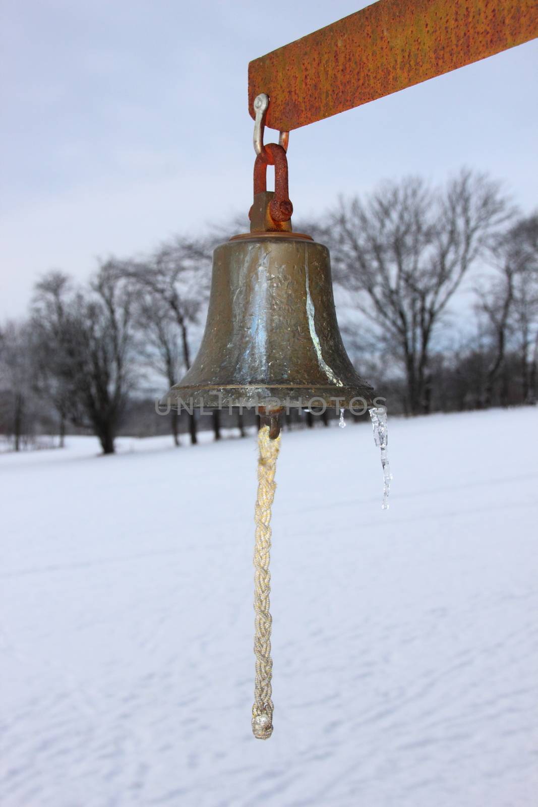 Metal Bell with Winter Snowy Fields in Background by HoleInTheBox