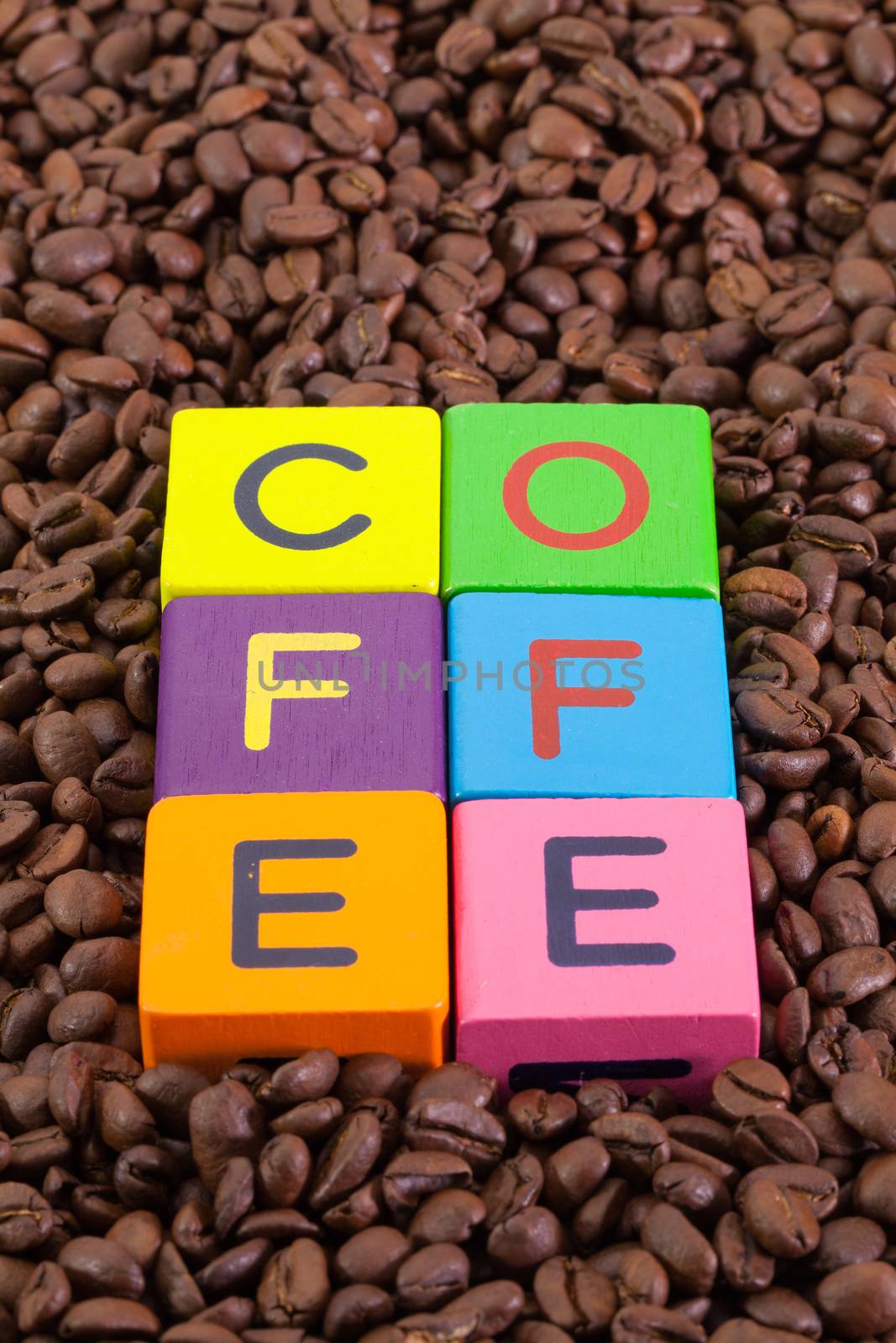 Colored children's cubes and coffee beans