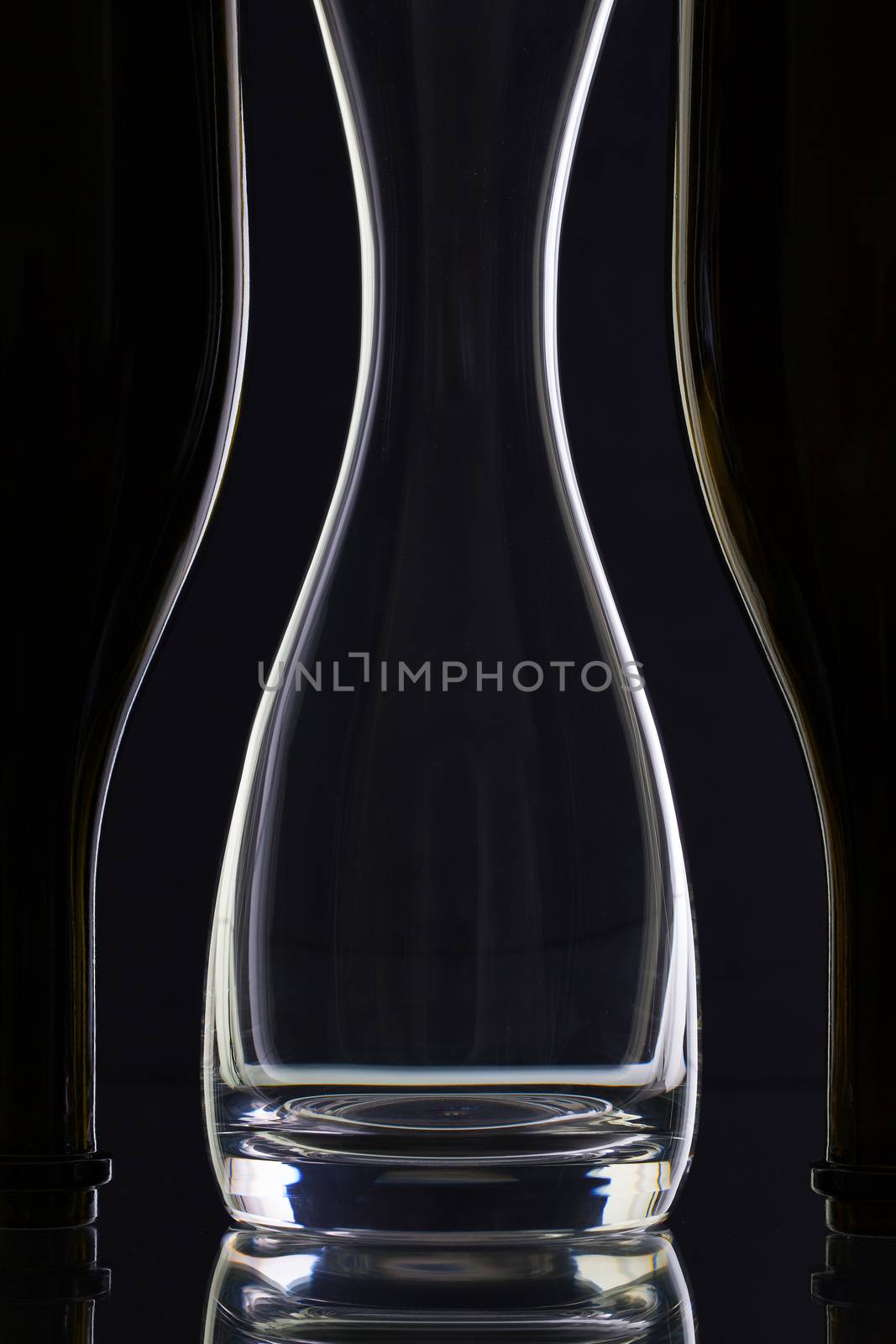 Empty glass and bottles  by CaptureLight