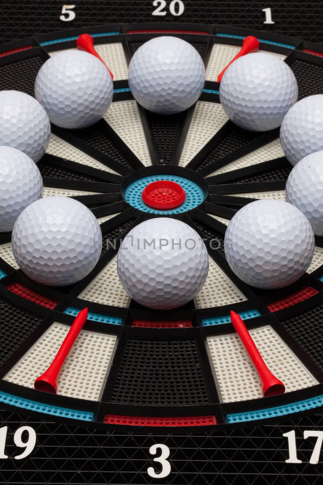 Detail dartboard with white golf balls