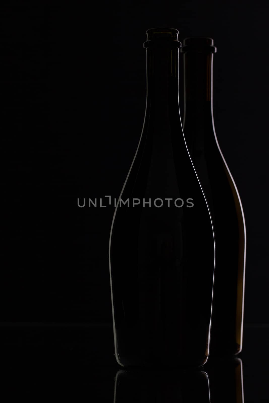Two different bottles of wine  by CaptureLight