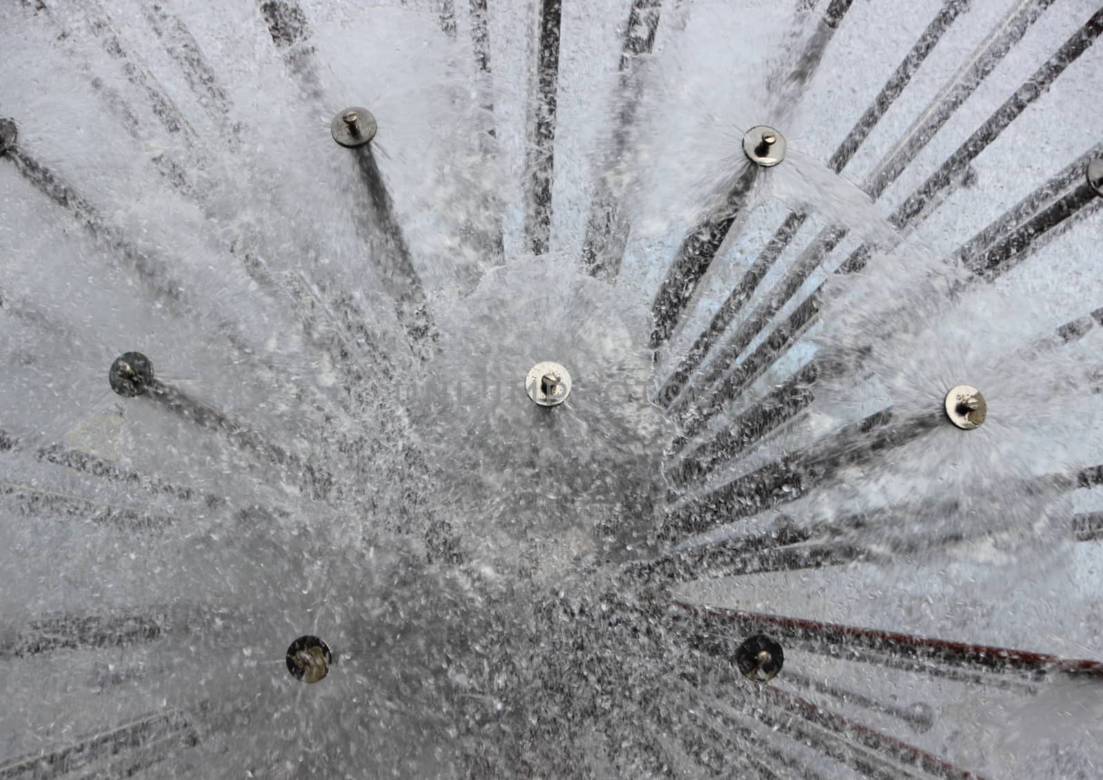 Abstract Water Splash from Circular Steel Tube Fountain by HoleInTheBox