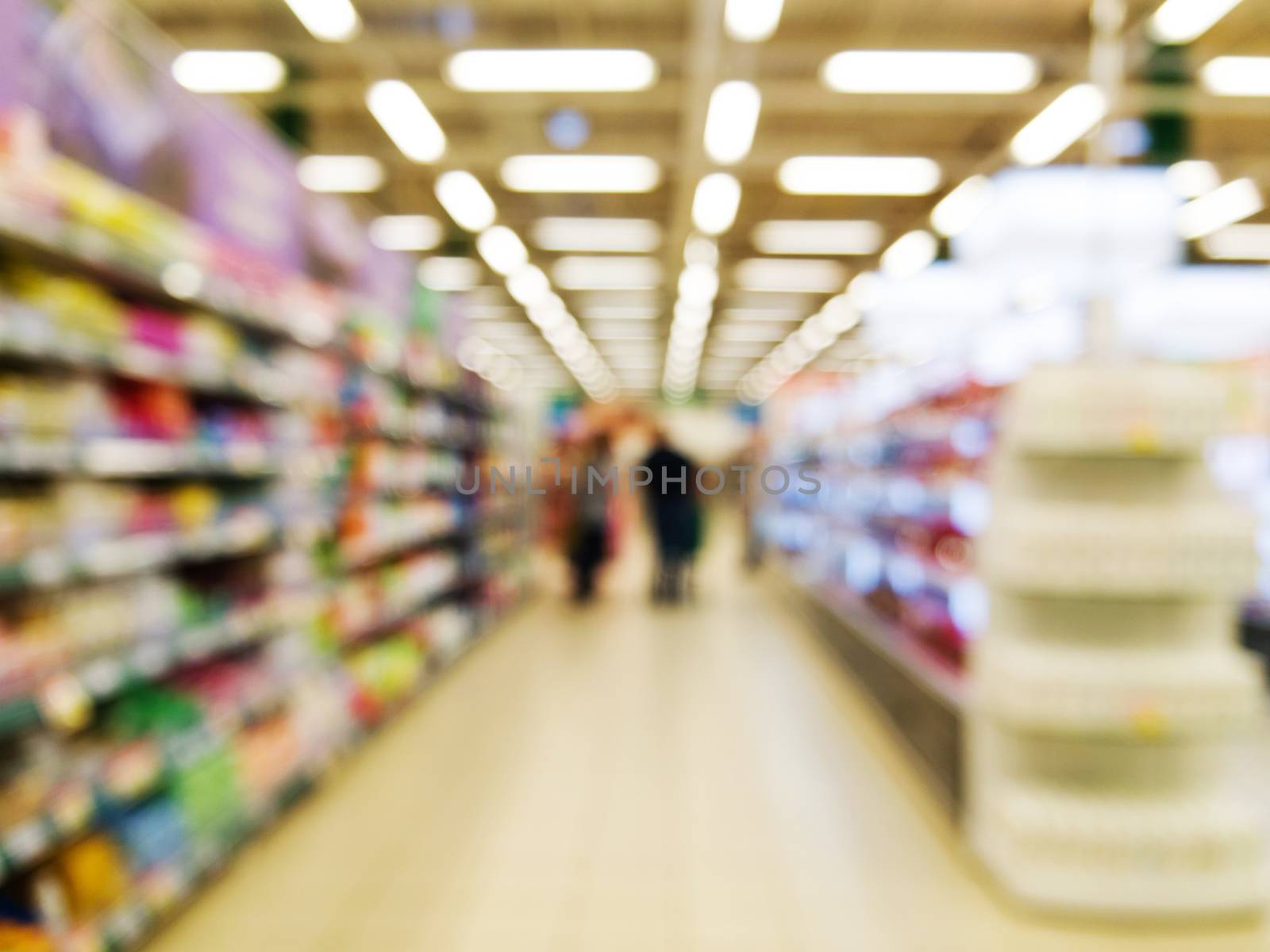 Abstract blurred colorful supermarket aisle by fascinadora