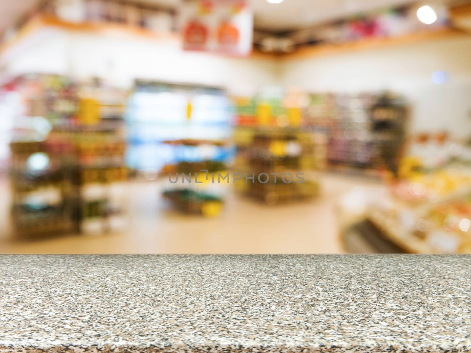 Marble empty table in front of blurred supermarket by fascinadora