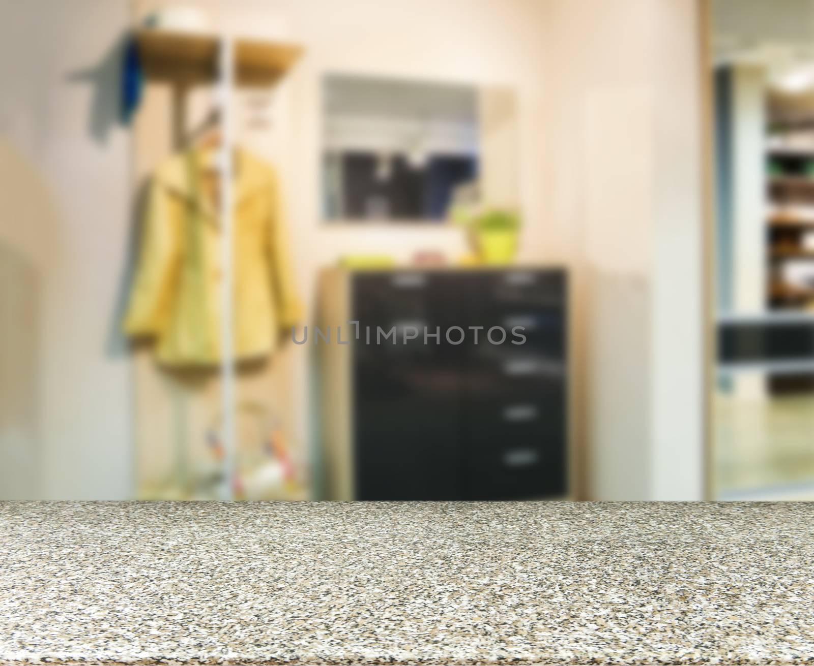 Marble empty table in front of blurred background. Perspective marble deck over blur in modern apartment interior. Mock up for display or montage your products