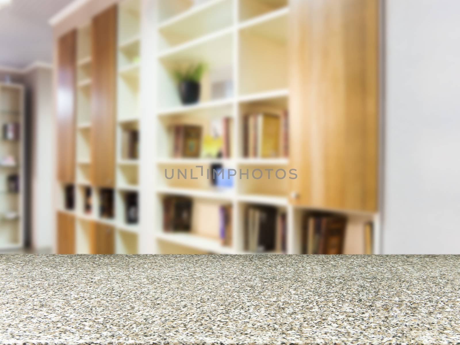 Marble board empty table in front of blurred background. Perspective marble board over blur in modern living room interior. Mock up for display or montage your products