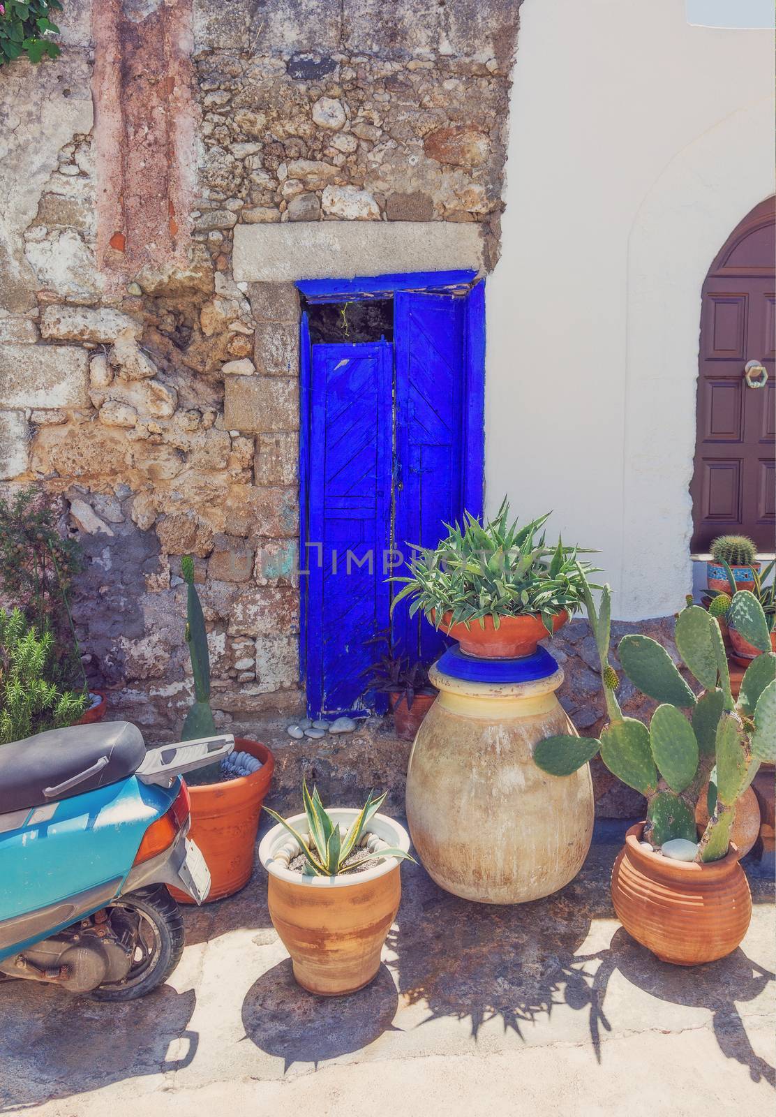 antique door in the colorful  village Koskinou on the island of Rhodes, Greece
