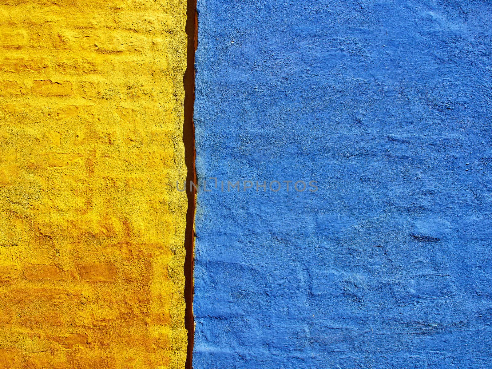 Bright colors blue and yellow wall grunge style