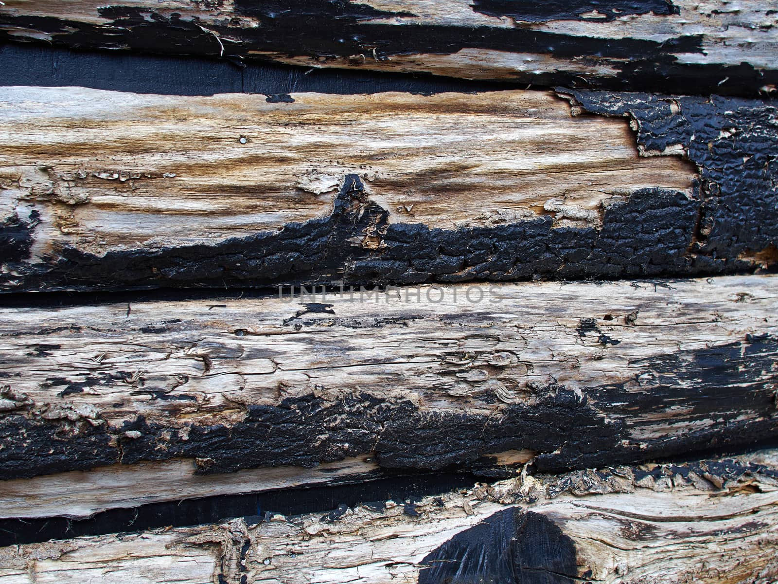 Grunge old peeling paint black wood logs texture background image