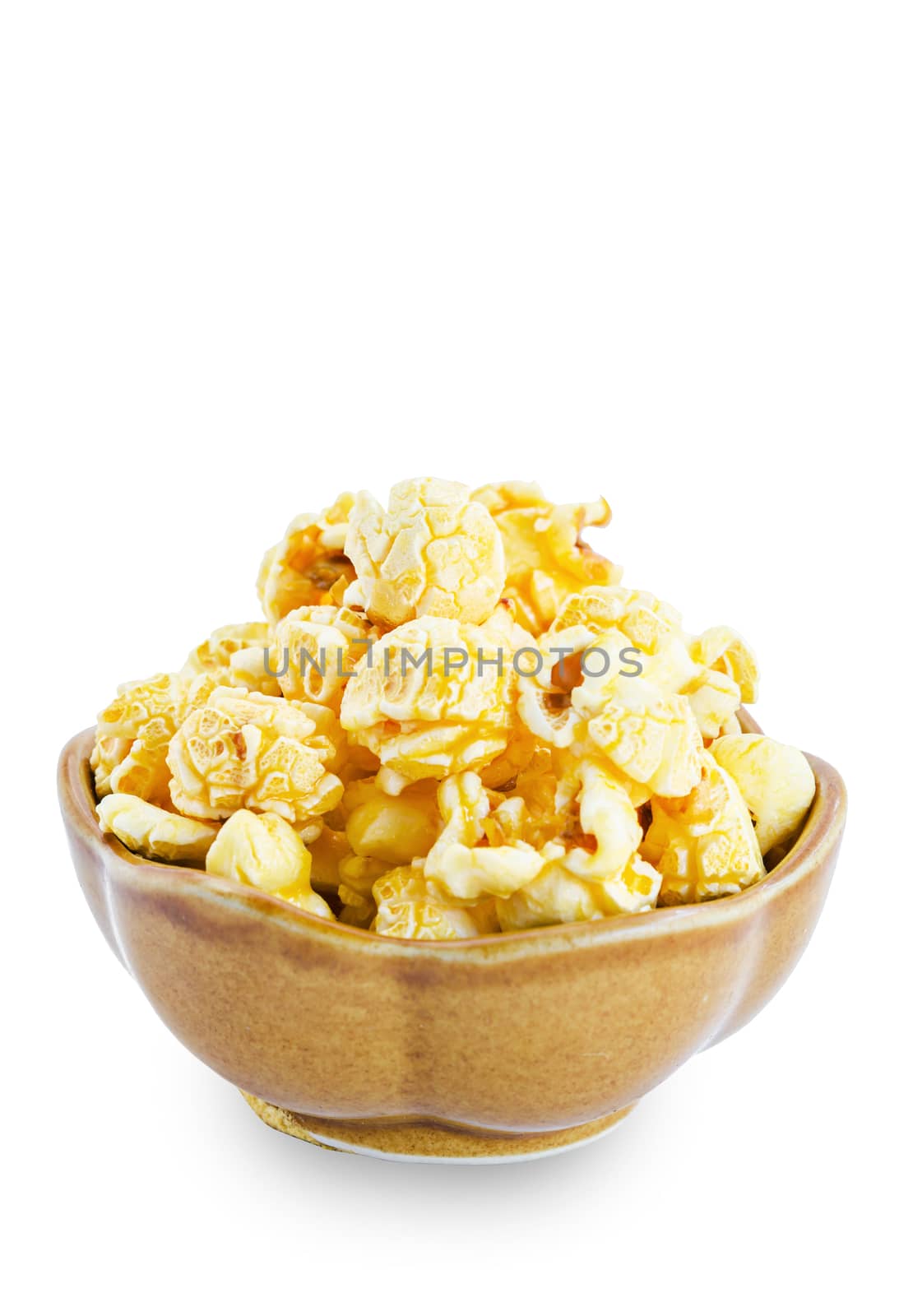 Sweet caramel popcorn in a bowl isolated on white background, Save clipping path.