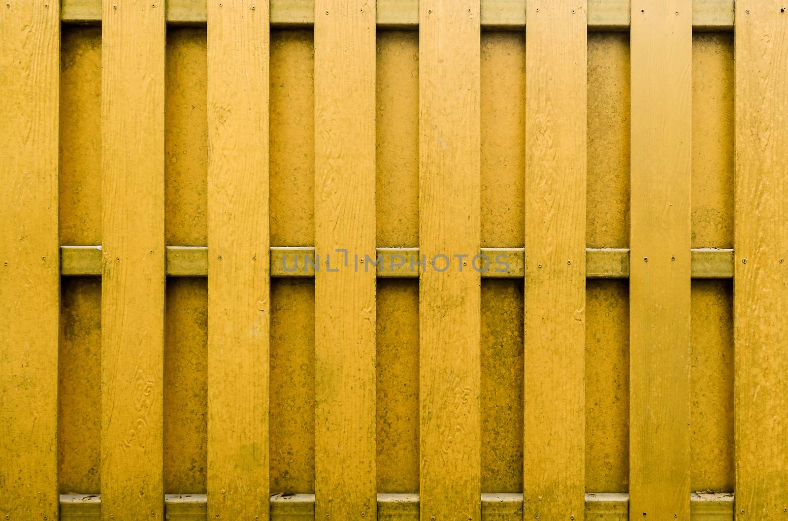 yellow wooden fence background. by koson