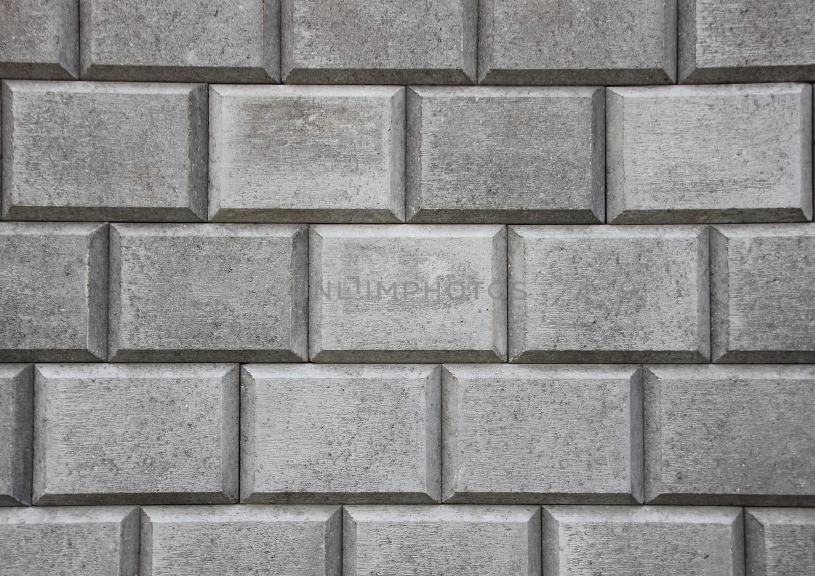 Simple Horizontal Grey Concrete Brick Closeup Background by HoleInTheBox