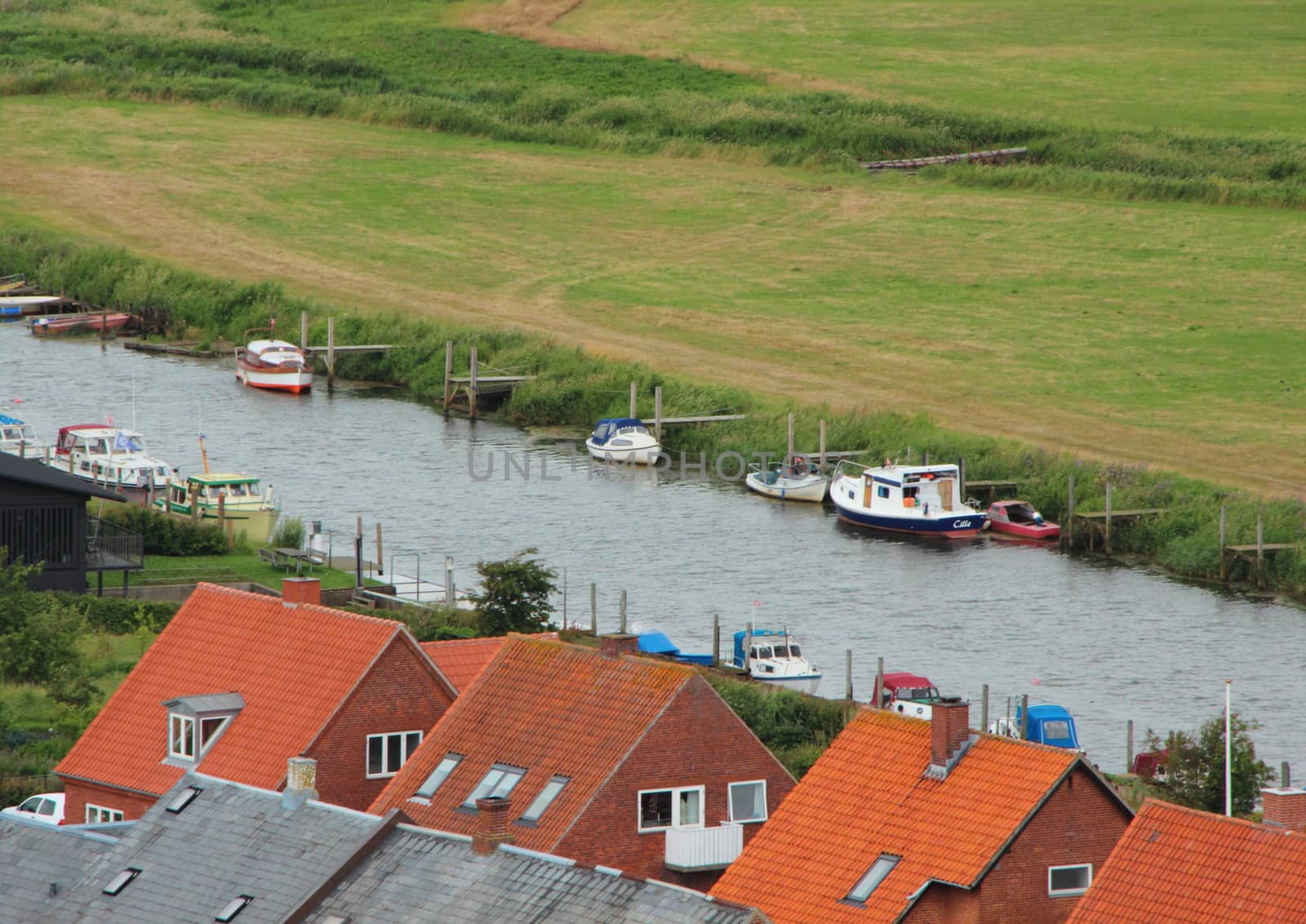 Small River with Boats and Houses in Aerial Perspective
