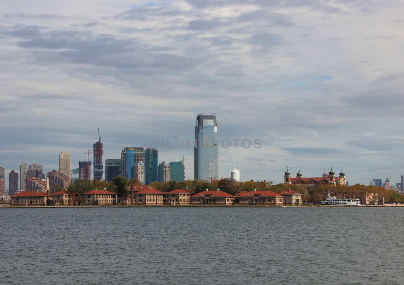 Ellis Island in New York with River and Skyline by HoleInTheBox
