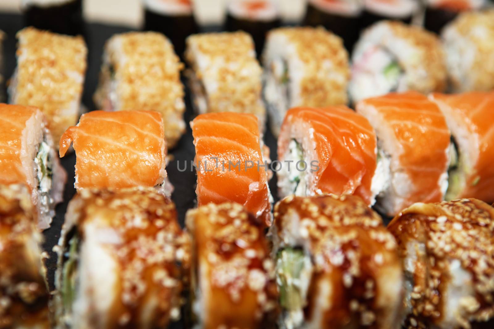 Best Types of Sushi Rolls. Philadelphia Roll, California Roll, Eel Avocado Roll. Delicious rolls and sushi with eel, salmon, shrimp, cucumber and philadelphia. Various delicious Types of Sushi Rolls