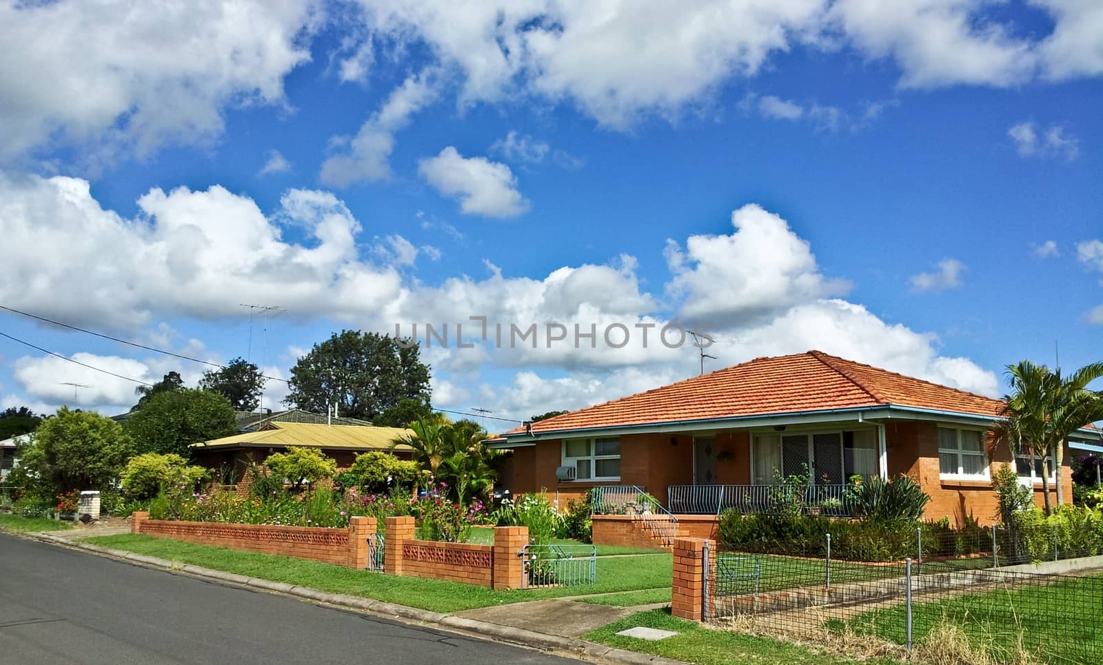 House with bright blue sky