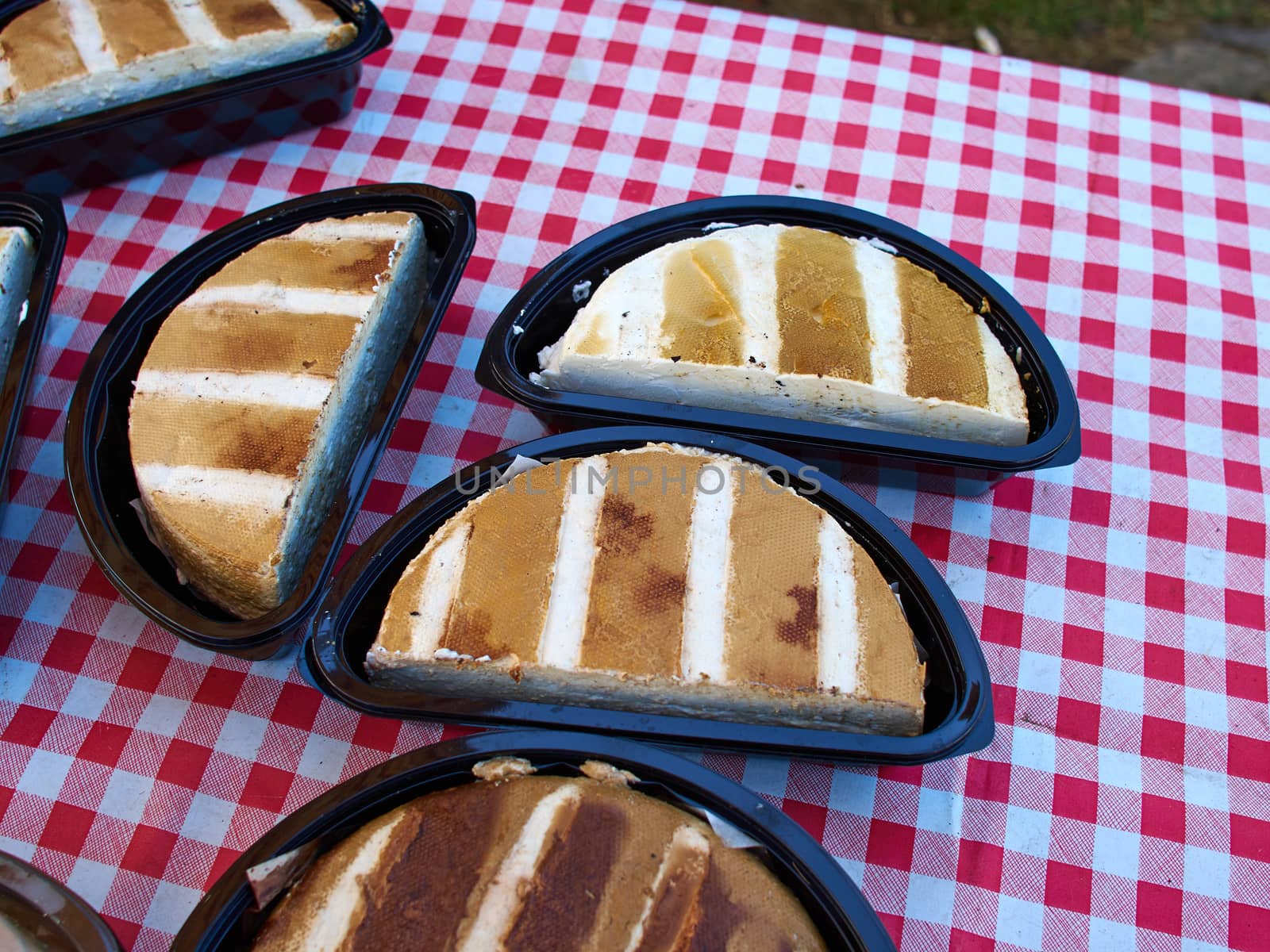 Typical traditional Danish smoked white cheese in a food market