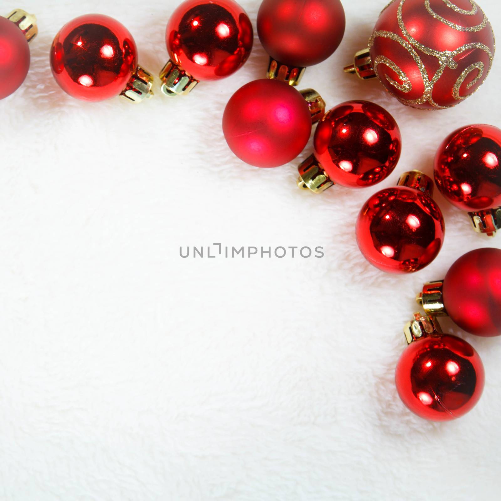 Christmas balls  on white fur background , Christmas concept