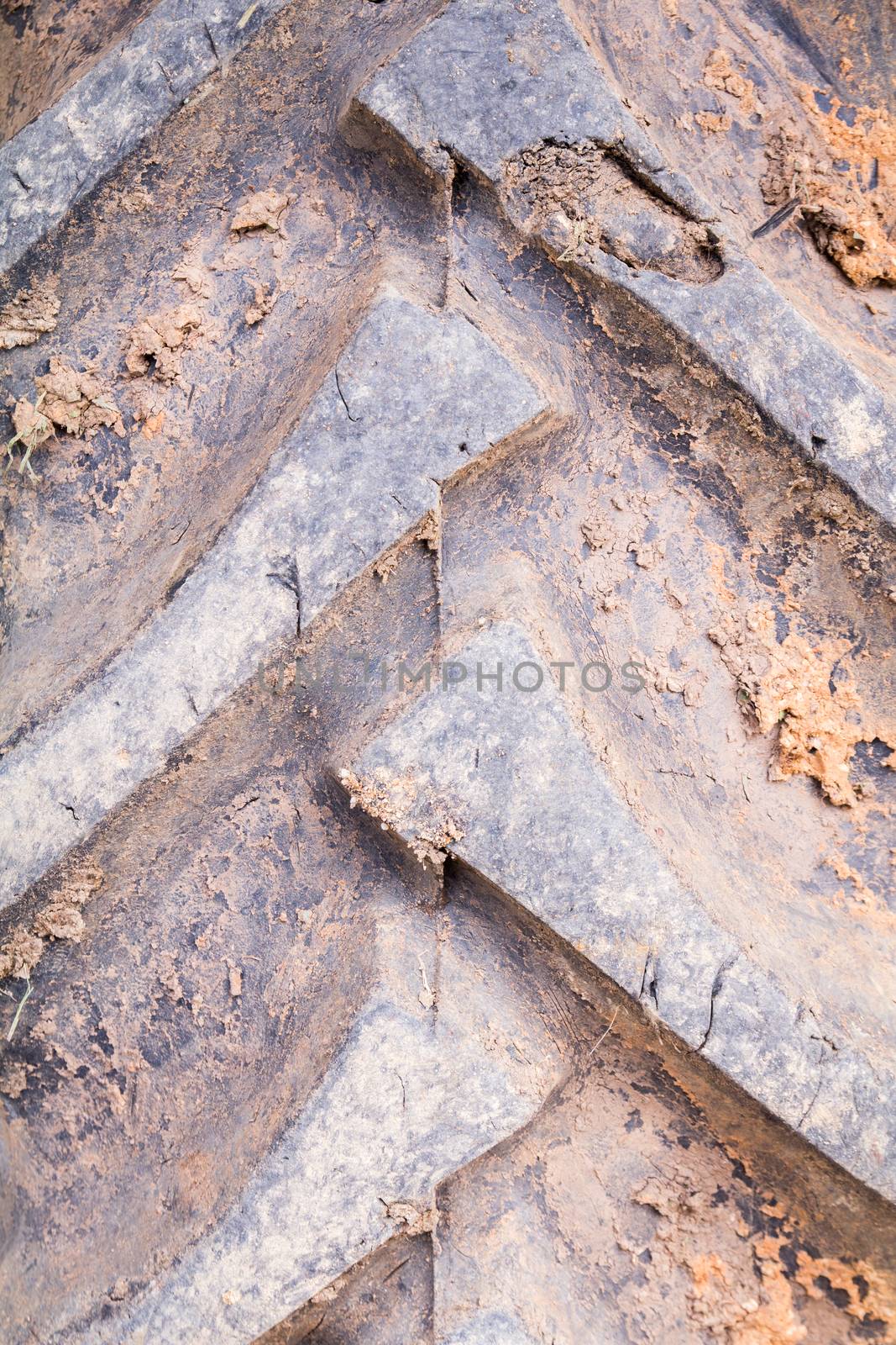 Close up of a muddy tractor tire