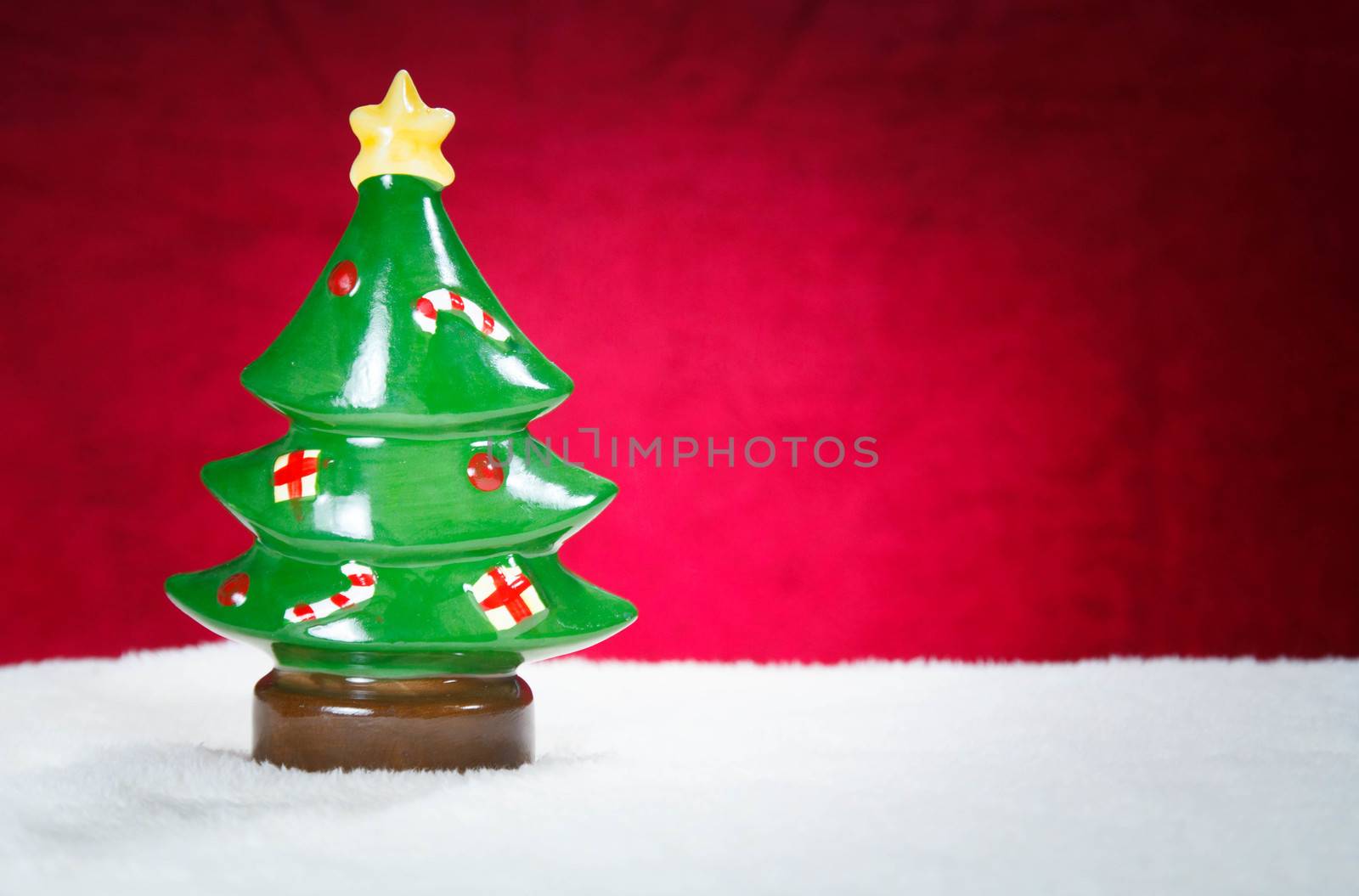 decoration Chriastmas tree ceramic on red background in concept Christmas