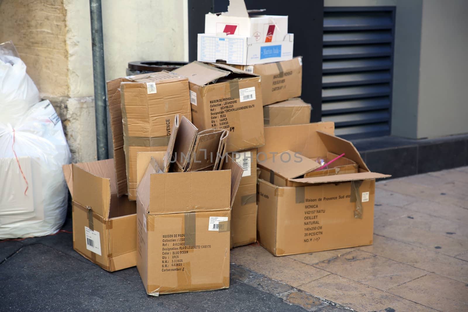 Aix-En-Provence, France - June 21, 2016: Empty Trash Cardboard Boxes in the Street of Aix-En-Provence, France