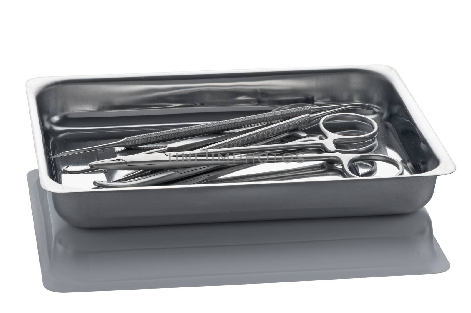 Tray with surgical tools from stainless steel isolated on a white background