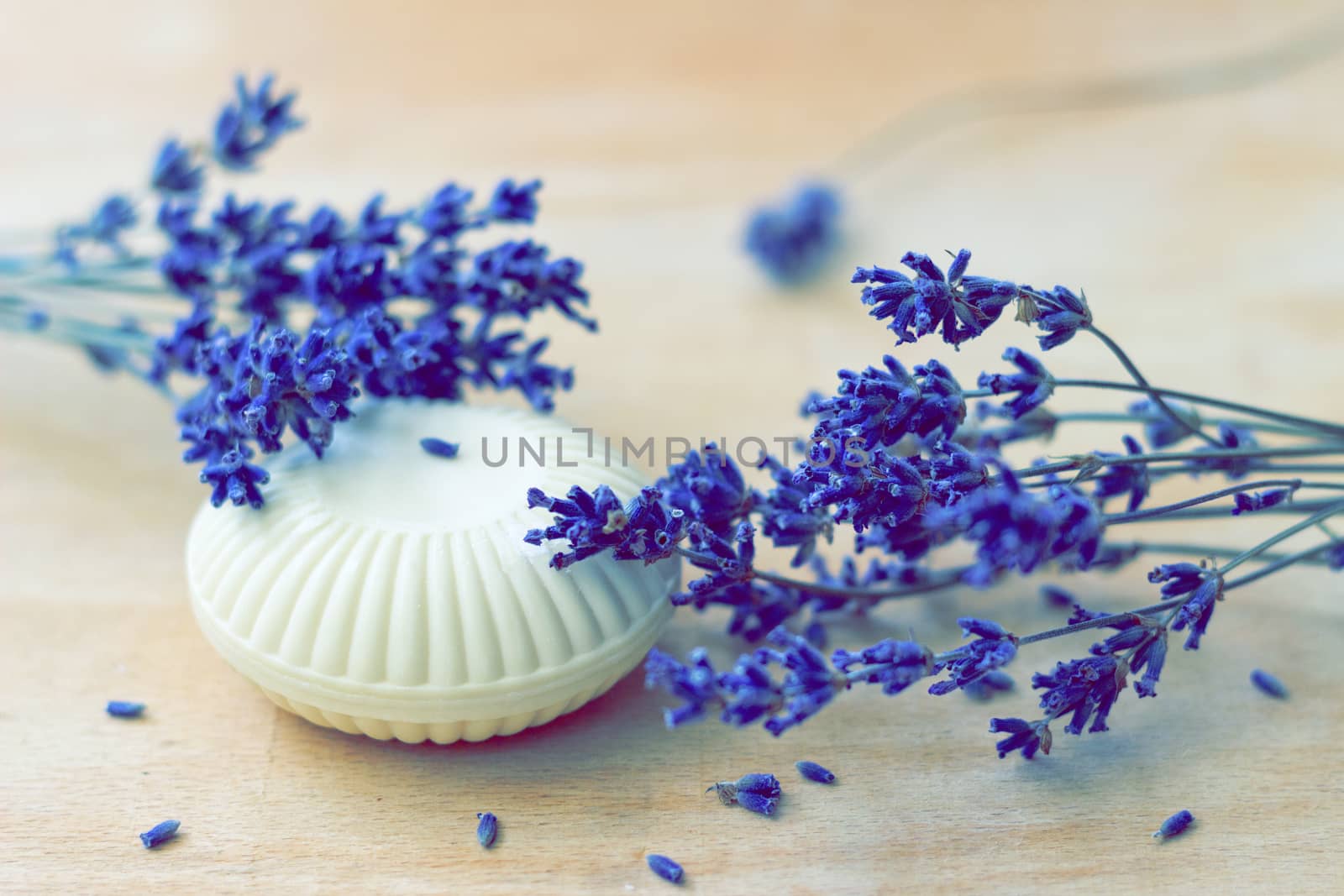 Lavender soap bars on wooden background - vintage retro color tone